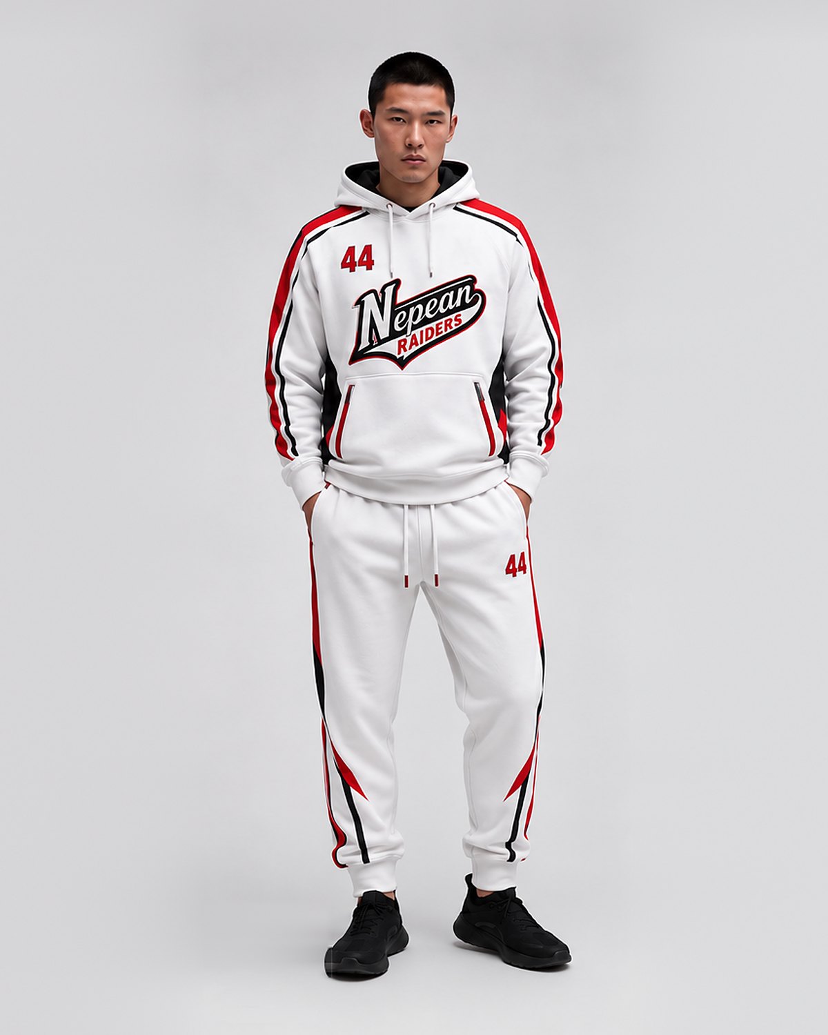 Custom white team hoodie and sweatpant set with red and black trim by Suit Up Tailors